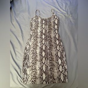 Snake pattern spaghetti strap skin tight dress.